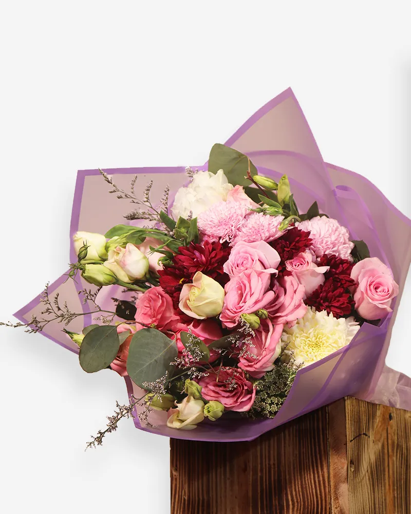 Ramo de flor variada en tonos rosas y lilas para regalar